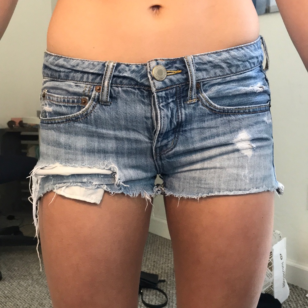 Low rise ripped jean shorts